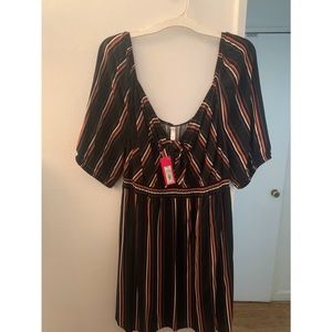 Never worn, with original tags.